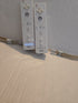 Pair Of Nintendo Wii Remotes With Nunchucks