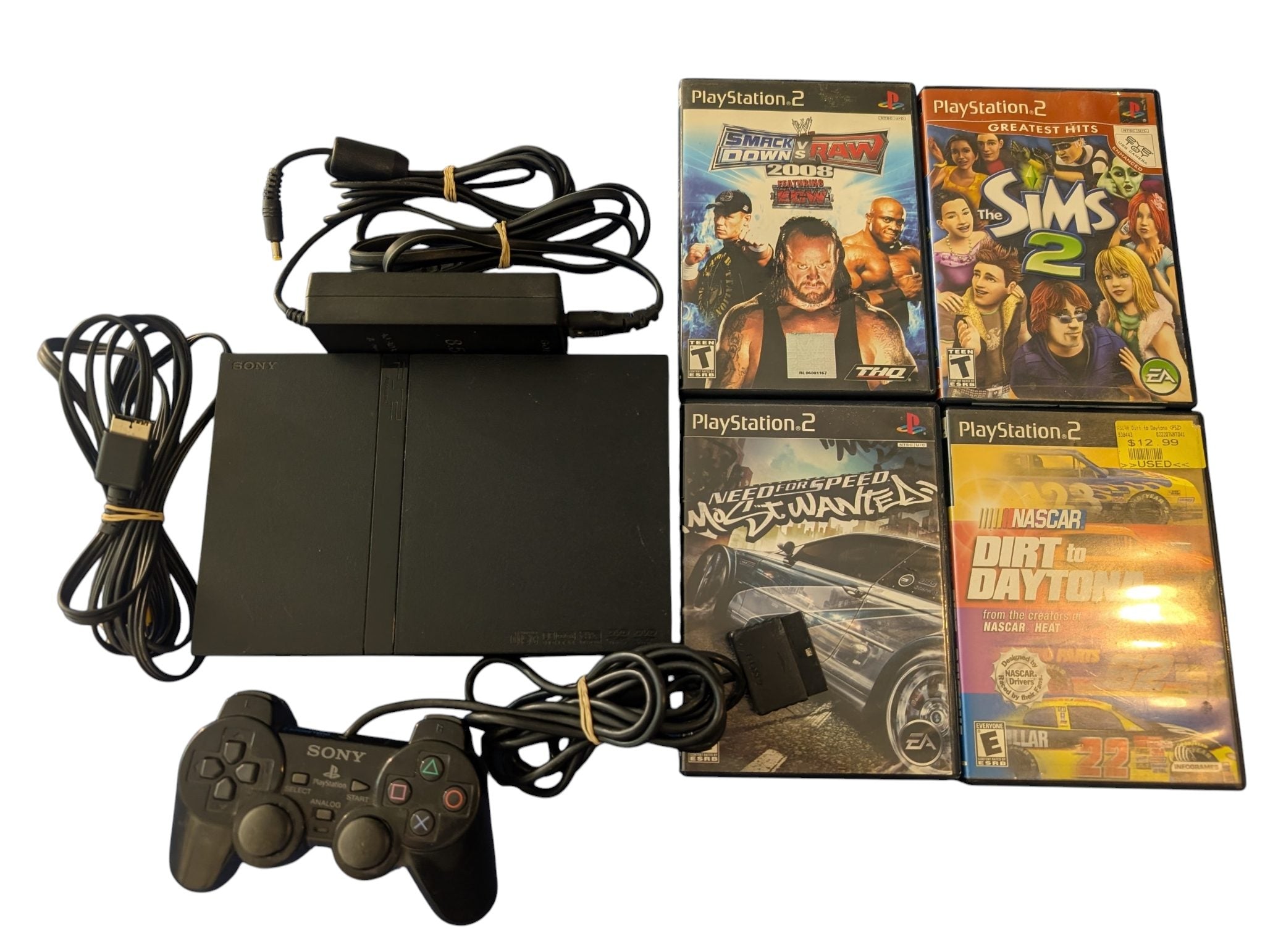 PlayStation 2 Slim Bundle w/ Controller, new laser + 4 games - (2004)