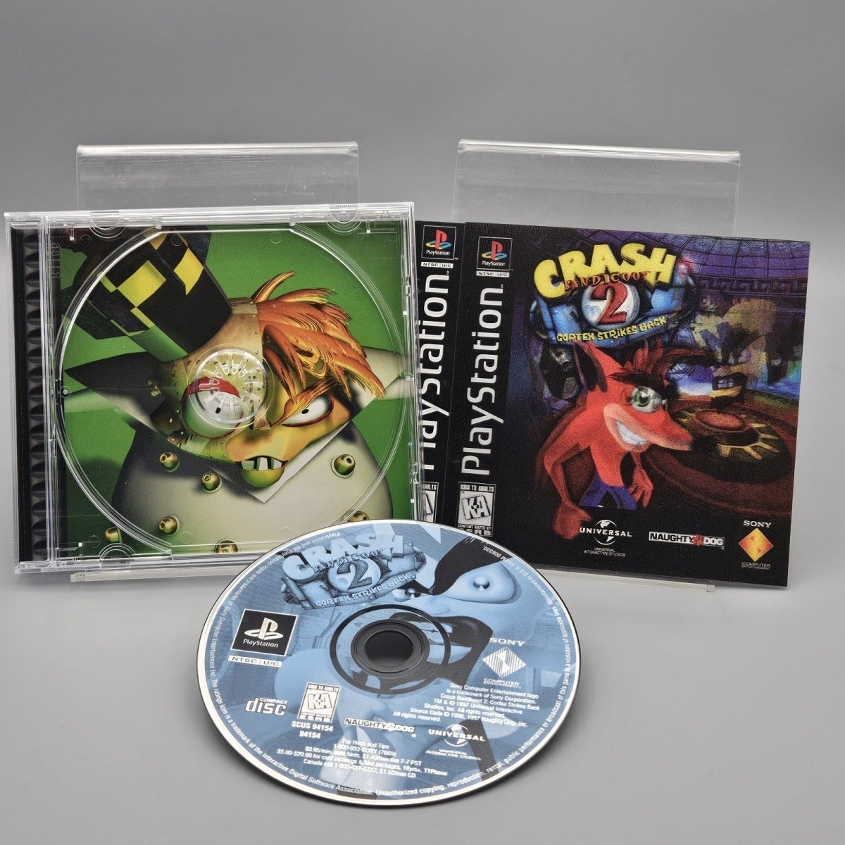 1997 – PlayStation 1: Crash Bandicoot 2 Cortex Strikes Back - Video Games - ThrowbackBuys - Pinnaclecollectibles