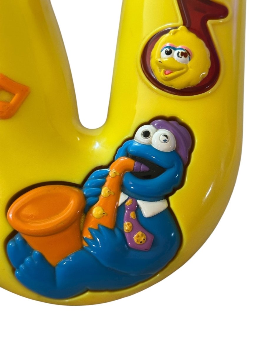 1999 – Mattel: Sesame Street Musical Cookie Monster Saxophone - Collectible Toys - ThrowbackBuys - Abunnysvintageco