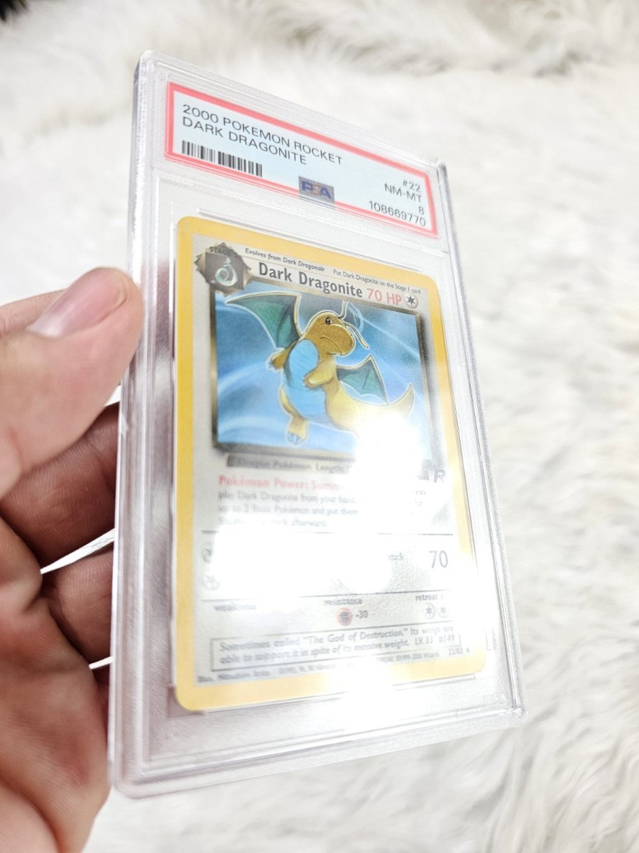 2000 Pokemon Team Rocket Dark Dragonite Non-Holo 22/130 - PSA 8 ThrowbackBuys 2000 Pokemon Team Rocket Dark Dragonite Non-Holo 22/130 - PSA 8 ThrowbackBuys