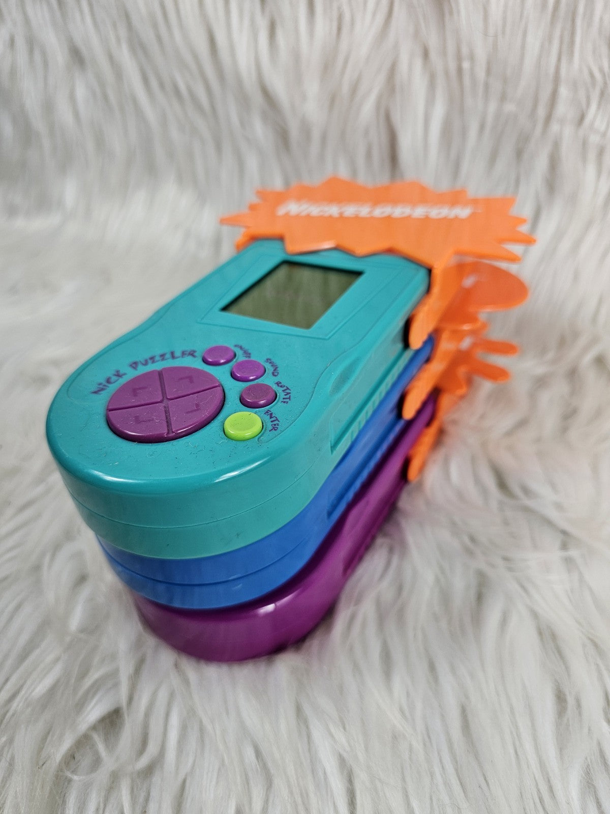 1995 - Nickelodeon Puzzler Memory Game Handheld Game