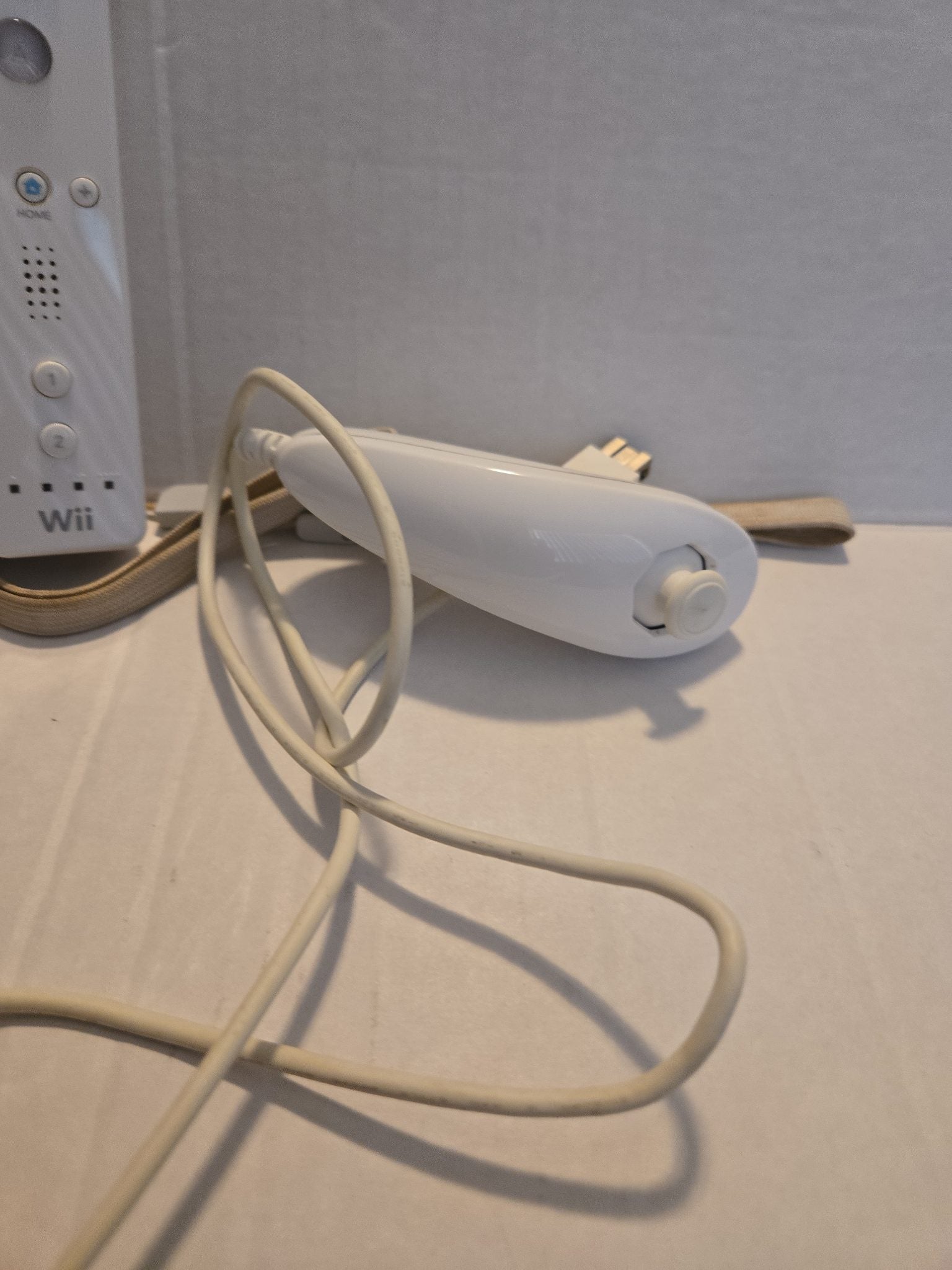 Pair Of Nintendo Wii Remotes With Nunchucks
