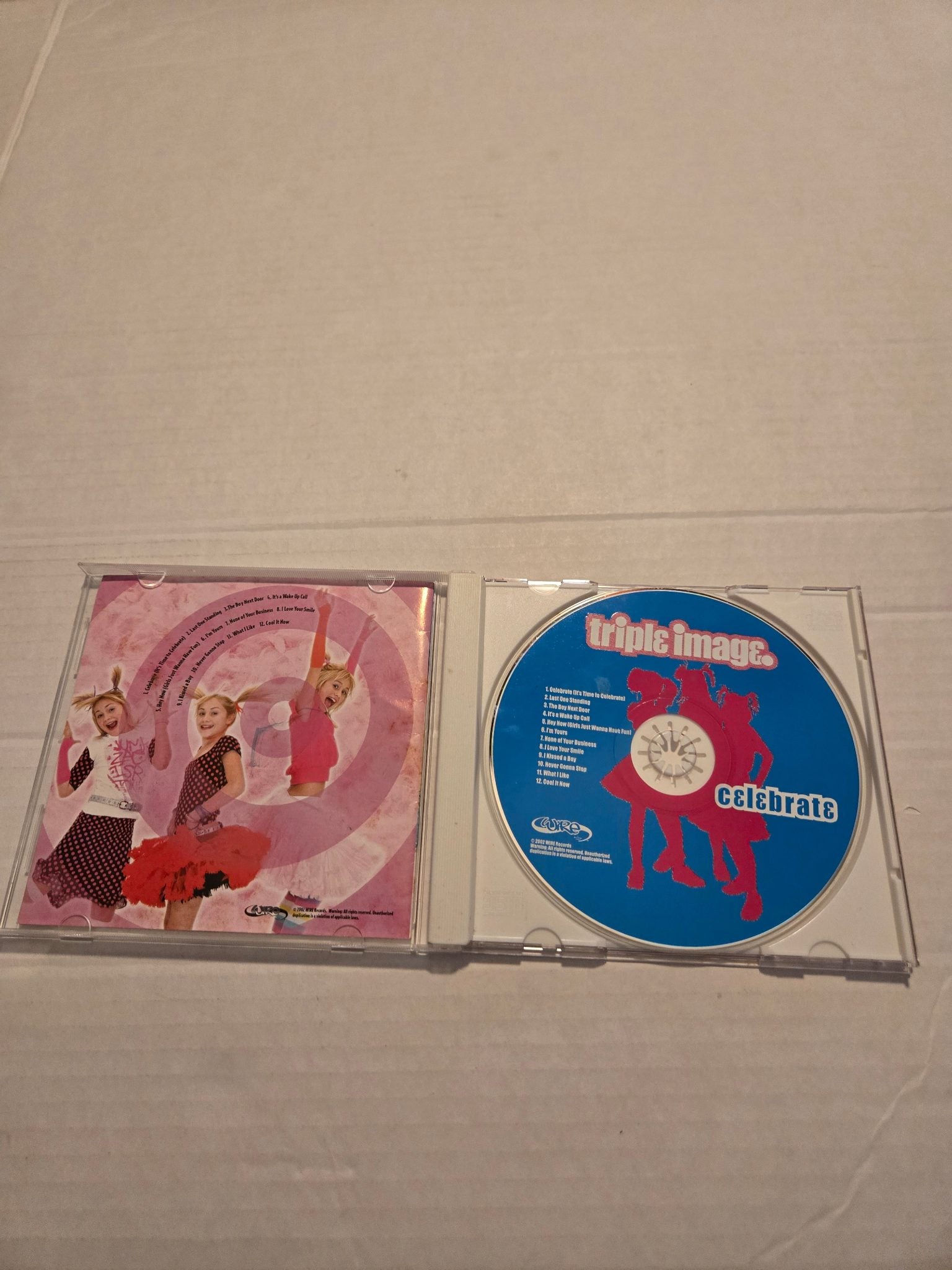 Triple Image Celebrate CD