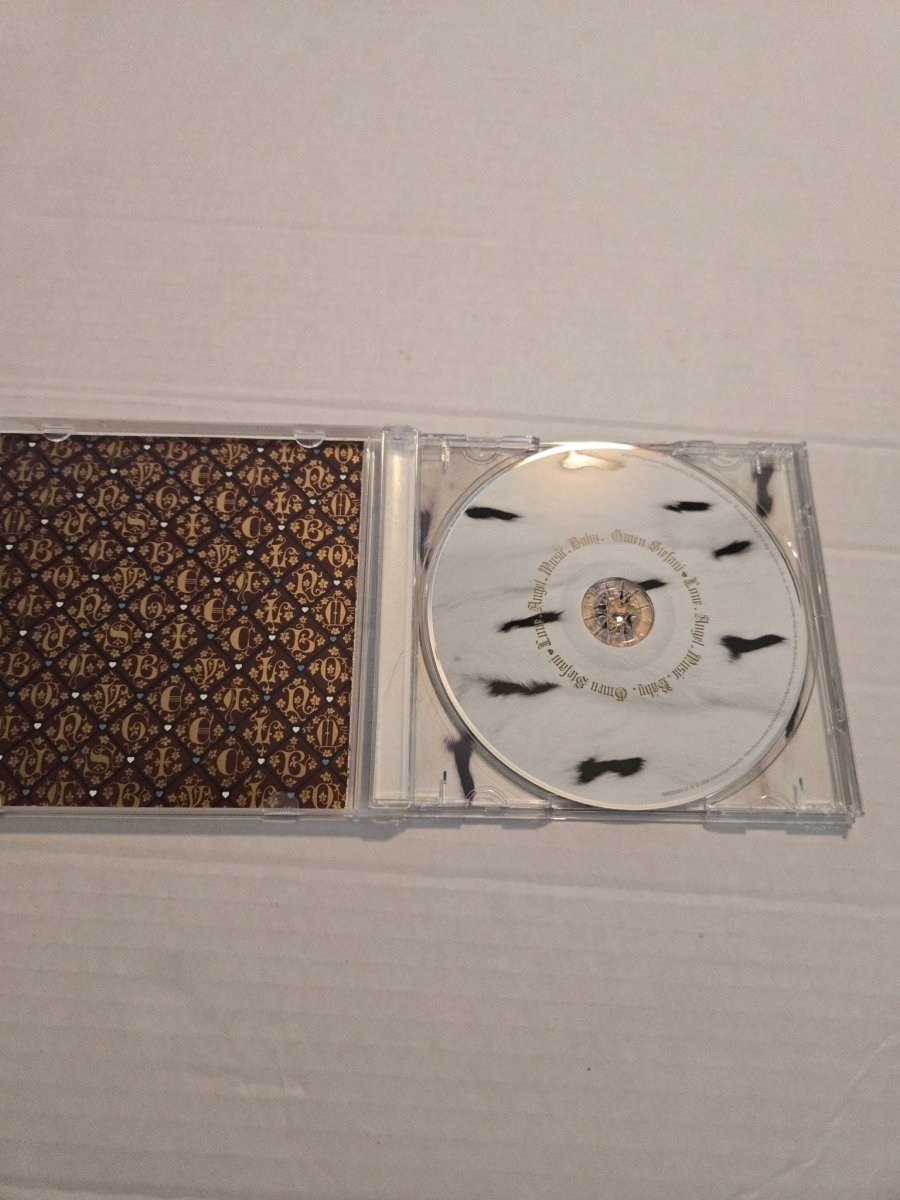 Gwen Stefani Love. Angel. Music. Baby CD - CDs - ThrowbackBuys -Amanda's Awesome Finds