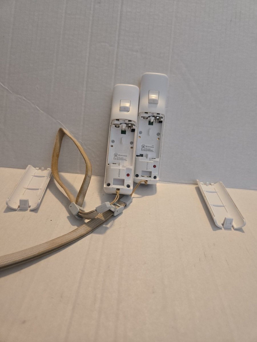 Pair Of Nintendo Wii Remotes With Nunchucks - Video Game Accessories - ThrowbackBuys -Amanda's Awesome Finds