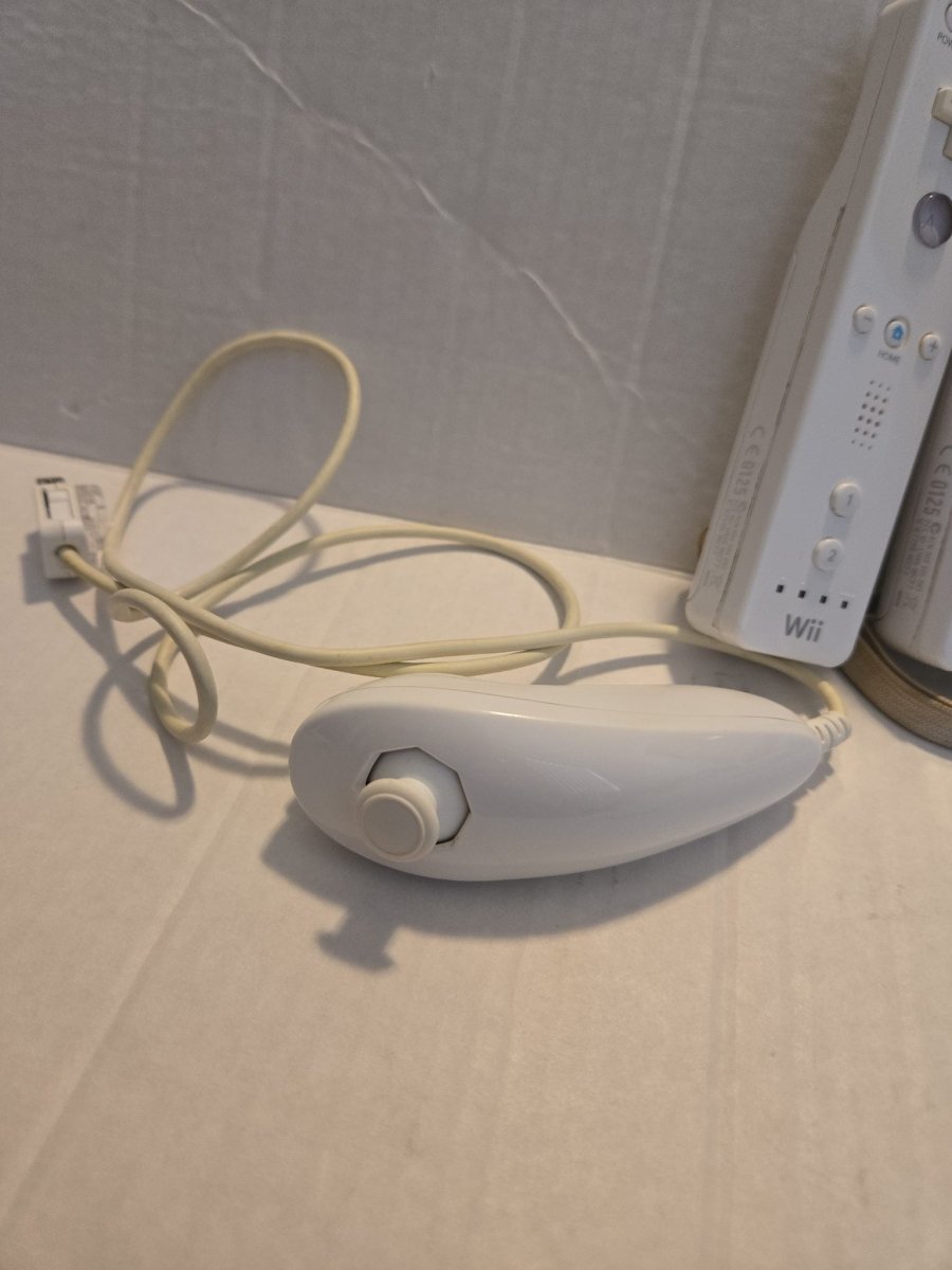 Pair Of Nintendo Wii Remotes With Nunchucks - Video Game Accessories - ThrowbackBuys -Amanda's Awesome Finds