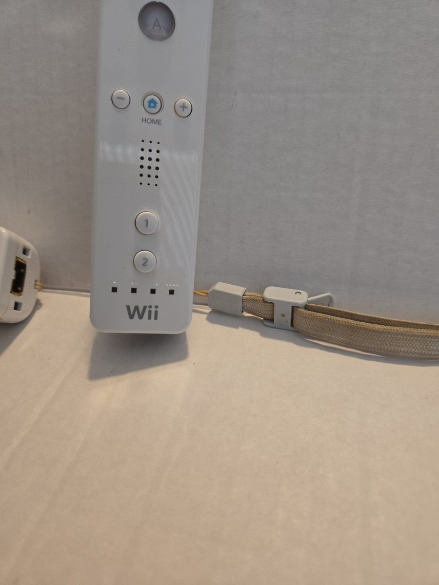 Pair Of Nintendo Wii Remotes With Nunchucks - Video Game Accessories - ThrowbackBuys -Amanda's Awesome Finds