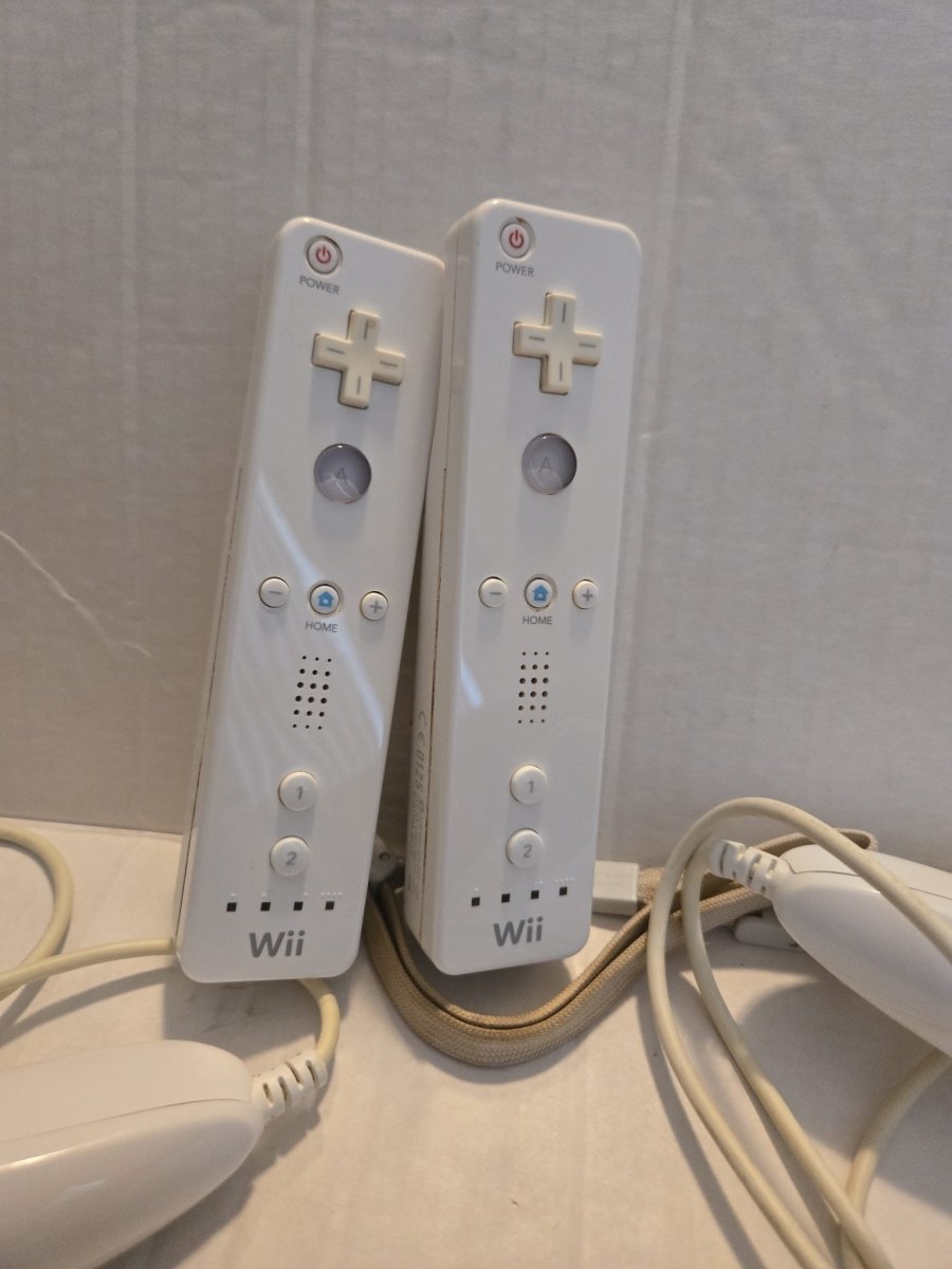 Pair Of Nintendo Wii Remotes With Nunchucks - Video Game Accessories - ThrowbackBuys -Amanda's Awesome Finds
