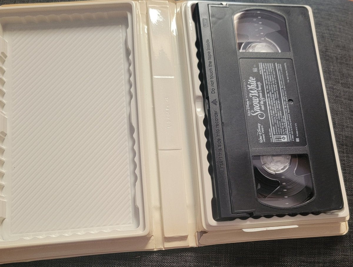 Snow White and the Seven Dwarfs VHS Tape Damaged Clamshell - VHS - ThrowbackBuys - Amanda's Awesome Finds