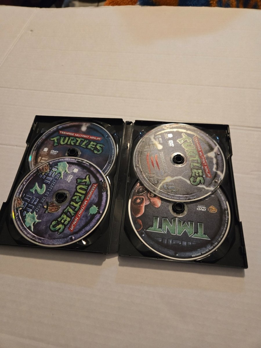 Teenage Mutant Ninja Turtles Movie Collection DVD 4 Disc Set - DVD - ThrowbackBuys - Amanda's Awesome Finds