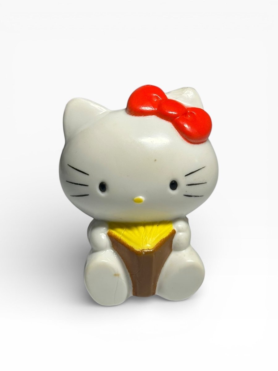 Vintage Sanrio Hello Kitty PVC figure reading book CBS Inc - 1983 - Action Figures & Collectibles - ThrowbackBuys - Abunnysvintageco