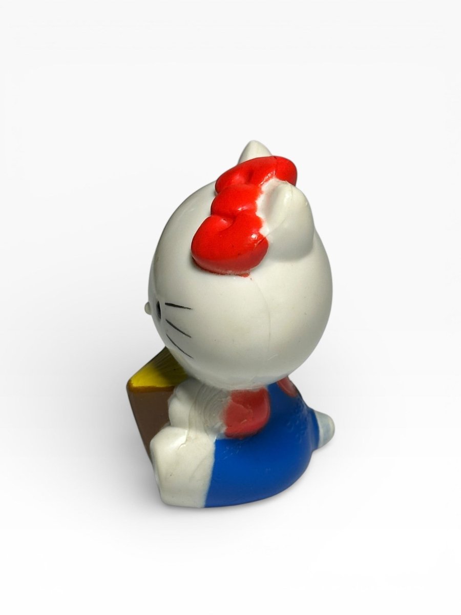 Vintage Sanrio Hello Kitty PVC figure reading book CBS Inc - 1983 - Action Figures & Collectibles - ThrowbackBuys - Abunnysvintageco